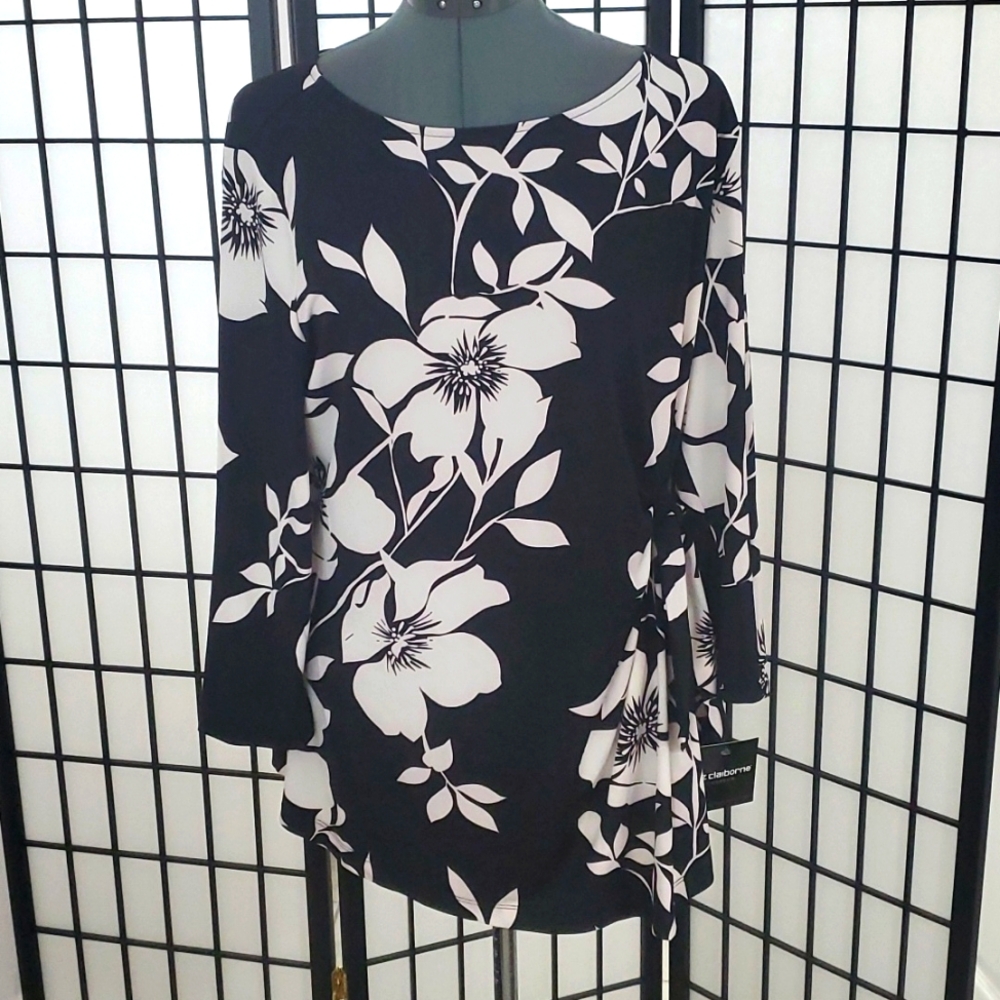 NWT long-sleeve top perfect for those black pants you keep on rotation! Large